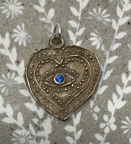 Bronze Eye Pendant with Lab Created Blue Sapphire