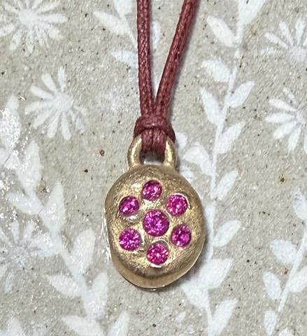 Seven Stone Bronze Pendant