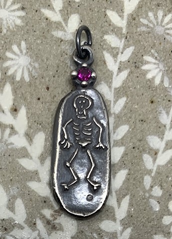 Skeleton Pendant with Lab Created Ruby