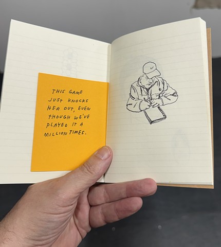 Jason Polan drawing me in my sketchbook as I draw in his