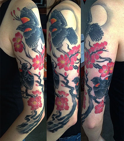 Red Wing Blackbird and cherry blossoms tattoo by Adam Sky, San Francisco, California