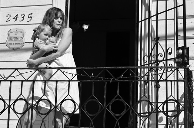 Mother and child on porch, Bywater - New Orleans