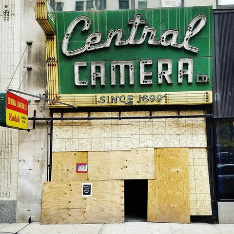 Central Camera reopens, still scarred by riots