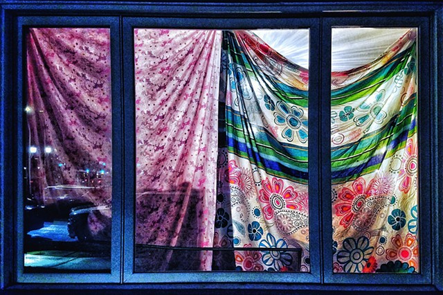 Window with colorful fabrics