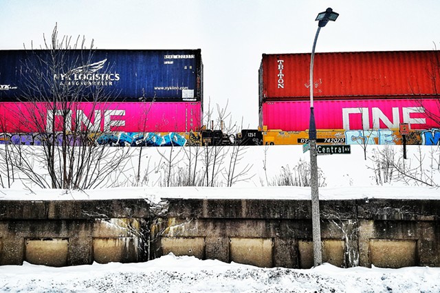 Freight train with pink boxcars