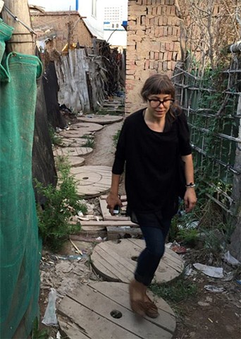 Amelia Tolkie exploring a Hutong in Lanzhou