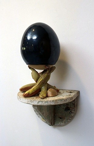 Hand-built ceramic egg with cast bananas
