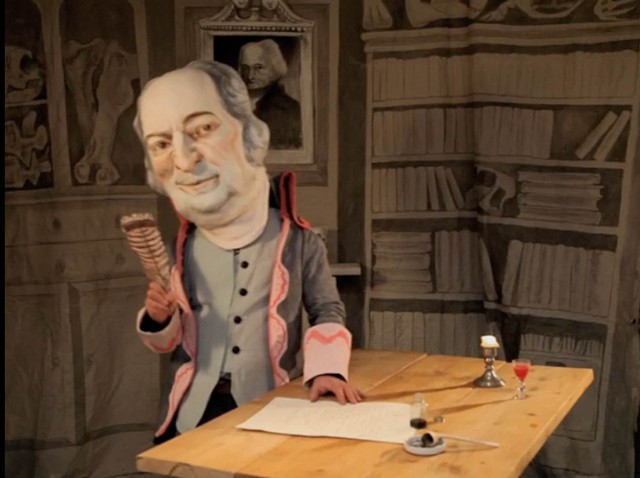 John Adams writing a letter