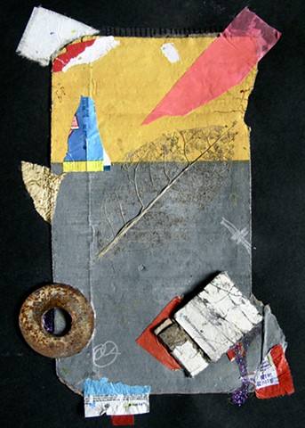 Abstract Found object art with cardboard, metal, foil, glitter nail polish, candy wrappers, and a leaf skeleton