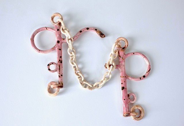 Breaking the Mouthpiece, 2026 Ceramic sculpture (hanging) 40 x 38 x 4cm