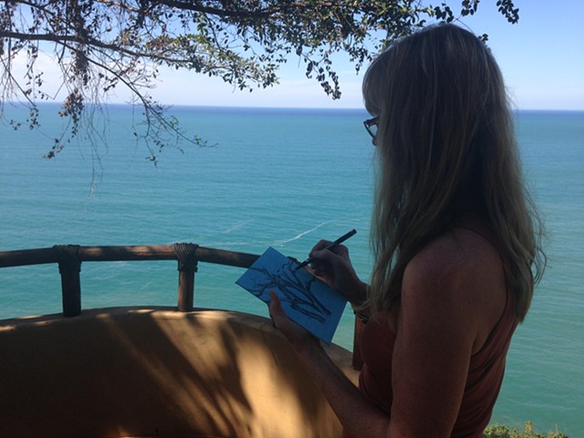 Working on a drawing in Chacala, Mexico