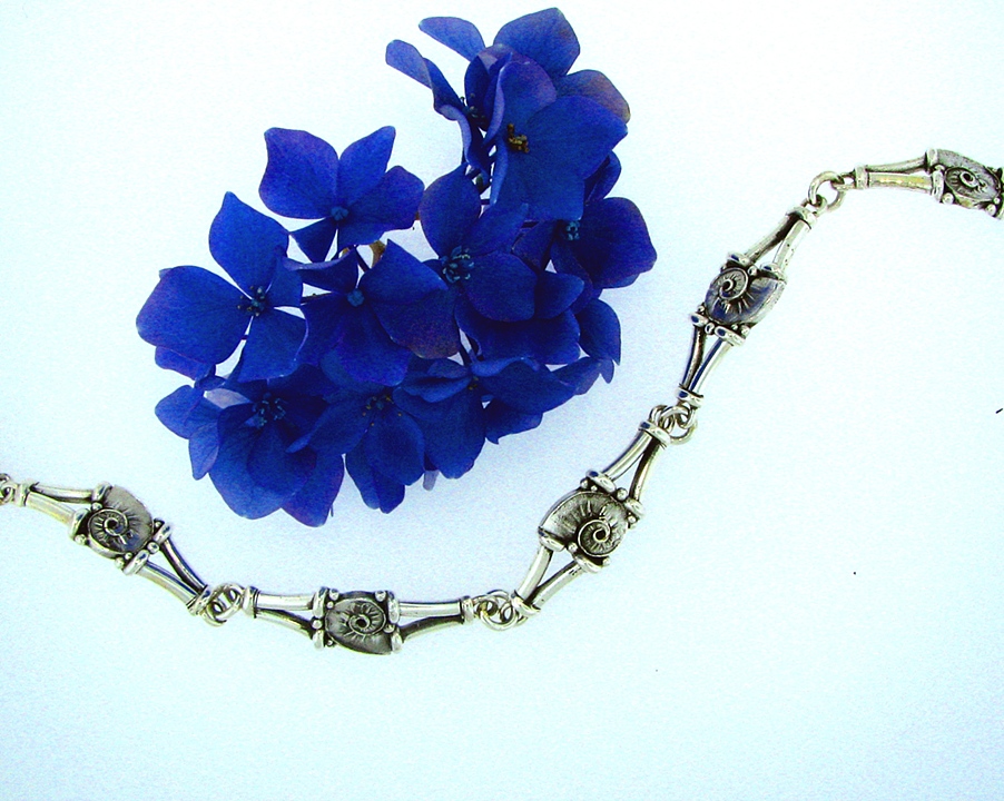 Sterling Silver link bracelet with lobster claw clasp.