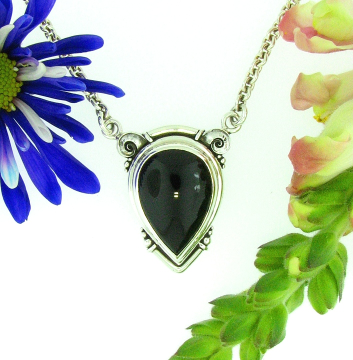 Casted sterling Silver pendant with 25x18mm Black Onyx cab. + attached cable chain.