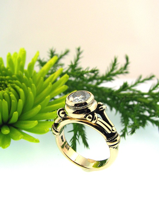 14k yellow gold platform style Engagement ring. Large modern brilliant solitaire. Details remain private upon customers request.