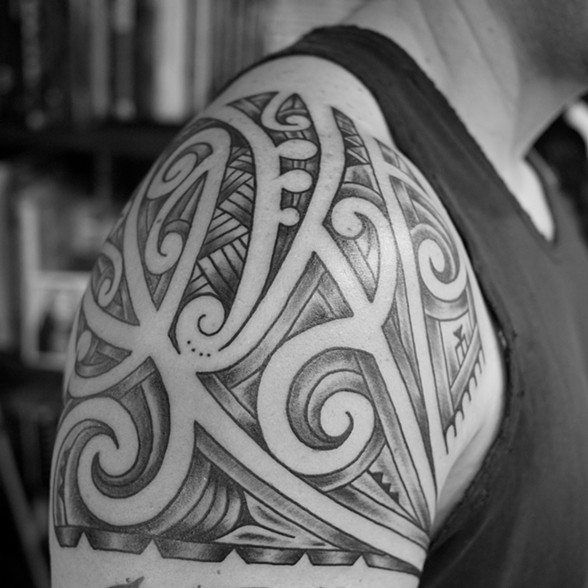CUSTOM TRIBAL AND BLACK WORK TATTOOS BY MIKEL